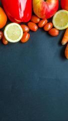 Assorted Citrus Fruits And Vegetables Black Background