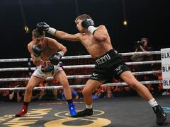 Nikita Tszyu TKOs Dylan Biggs with violent liver punch to claim ...