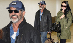 Mel Gibson looks happy as lands in Sydney with girlfriend Rosalind ...