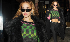 Rita Ora flashes her toned abs in a green crop top and black jeans ...