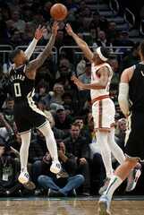 Lillard hits milestone, Giannis has triple-double as Bucks beat ...