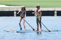 Gisele Bundchen stuns in black string bikini during paddleboard ...